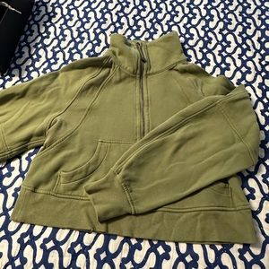 Has a small snag bottom left hem.